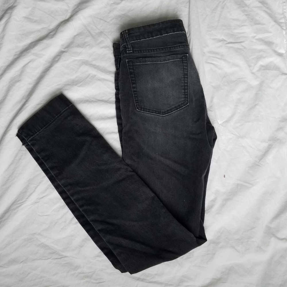 Faded black skinny jeans